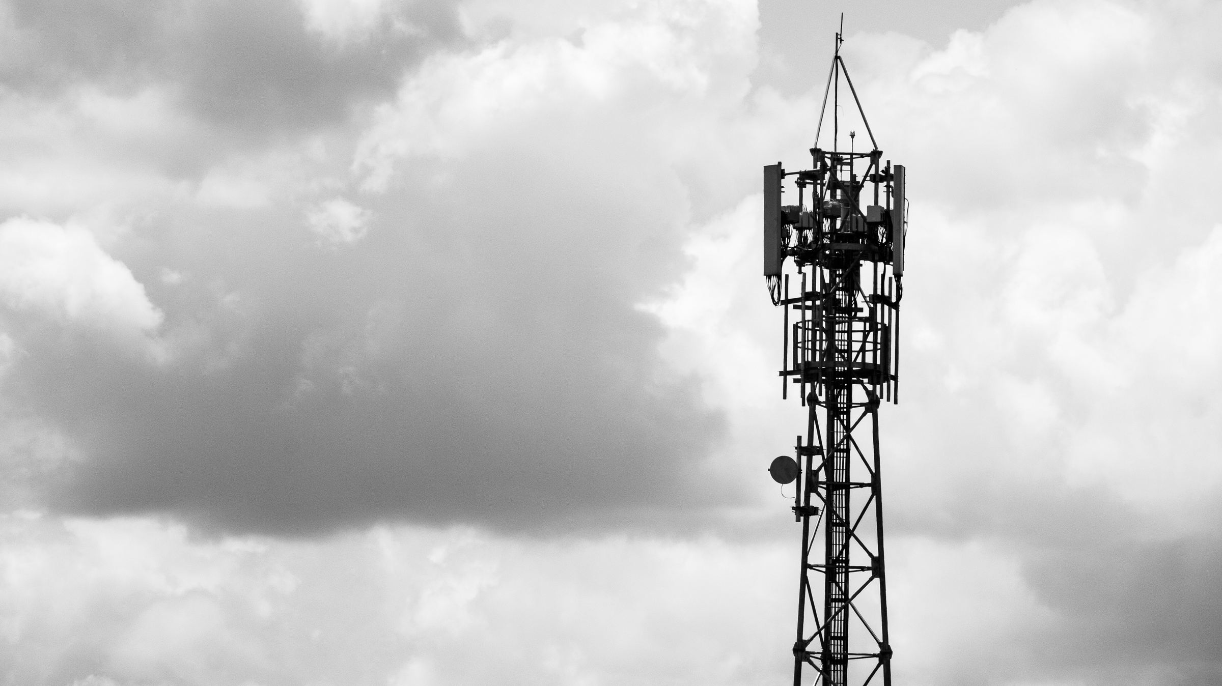 Grayscale Photo of a Cell Tower 